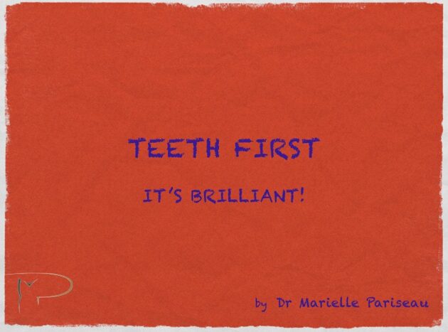 A red paper with the words teeth first it's brilliant written in blue.