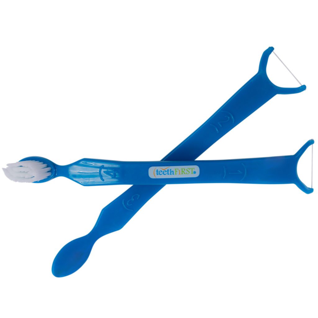 A pair of blue toothbrushes with white handles.